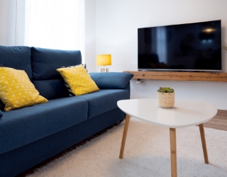 stylish-living-room-with-big-blue-sofa